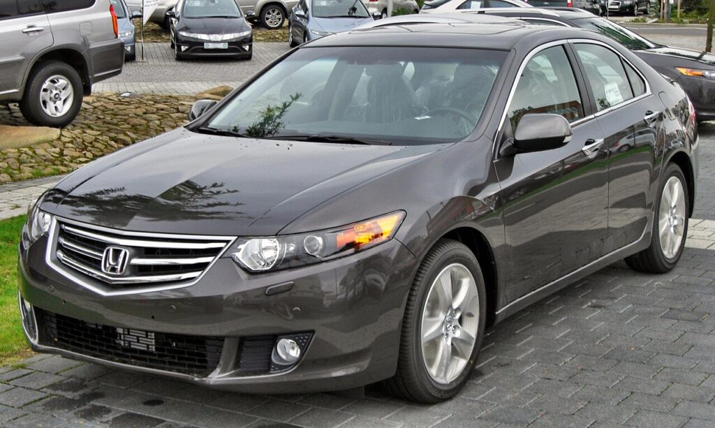 An image of parked black Honda Accord Euro for article best sedans under 10k