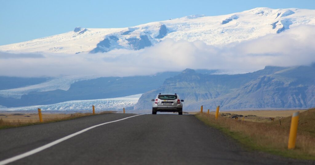 An Image of SUV driving on highway in snowy area for the article best car for highway driving